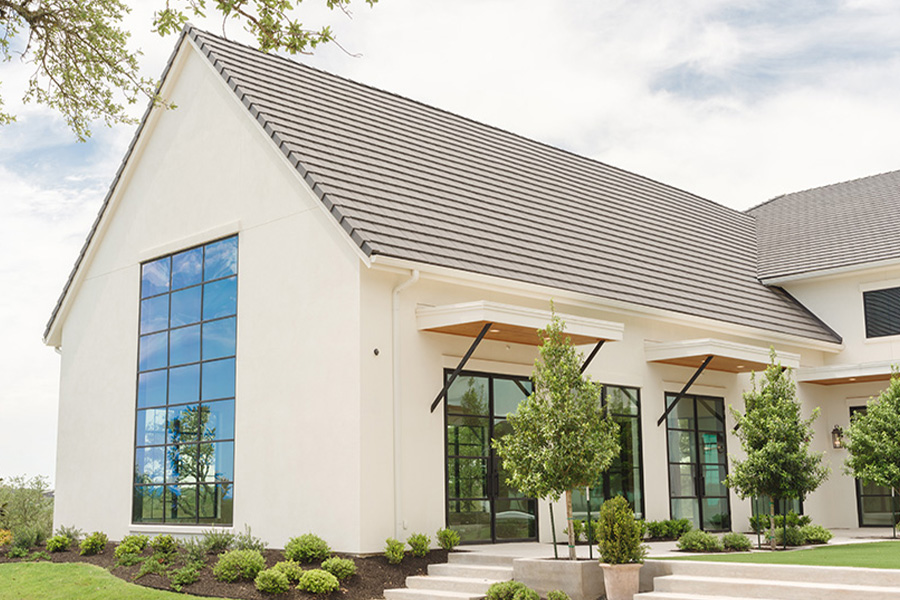 The Arlo's contemporary exterior with a covered veranda and floor-to-ceiling black-framed windows